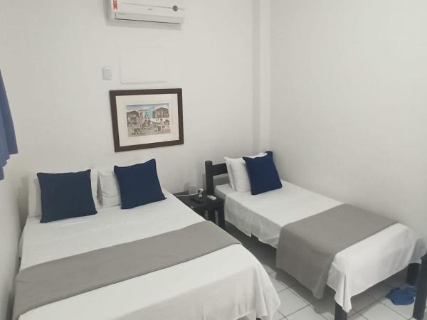Pousada Estrela do Mar : photo 2 de la chambre chambre triple standard