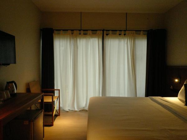 Nature Beach Resort : photo 10 de la chambre chambre double - vue sur jardin