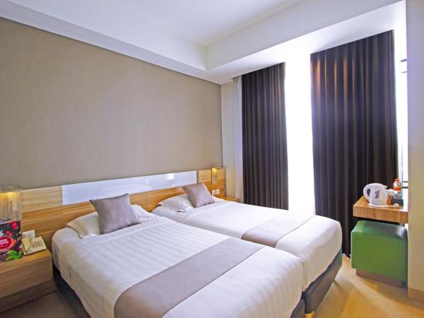 Hotel FortunaGrande Seturan Yogyakarta : photo 1 de la chambre chambre lits jumeaux Économique