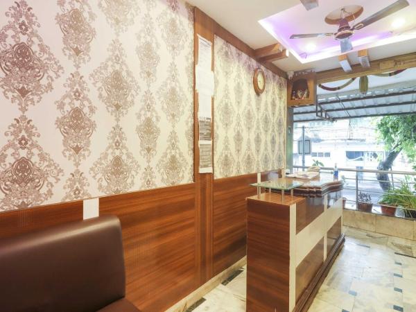 Hotel O Flagship 73783 Sai Pariwar Near Snow World : photo 7 de la chambre chambre triple classique