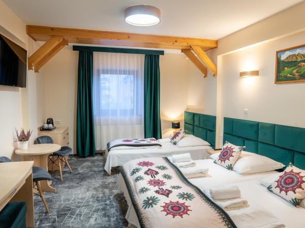 Willa Monte Rosa : photo 1 de la chambre chambre triple standard