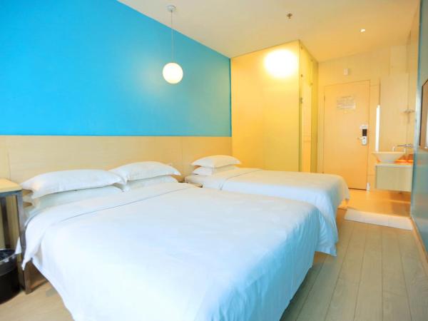 Colour Inn - She Kou Branch : photo 3 de la chambre chambre lits jumeaux deluxe