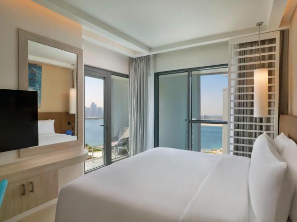 NH Collection Dubai The Palm : photo 1 de la chambre appartement club 1 chambre premium - vue sur mer