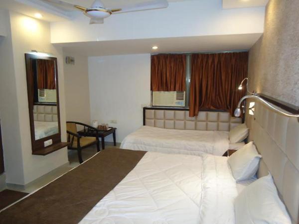 Hotel Maan Residency Satellite Road : photo 5 de la chambre chambre deluxe
