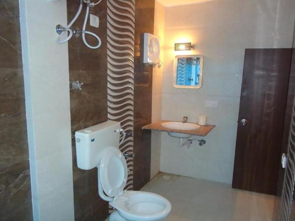 Hotel Maan Residency Satellite Road : photo 2 de la chambre chambre deluxe