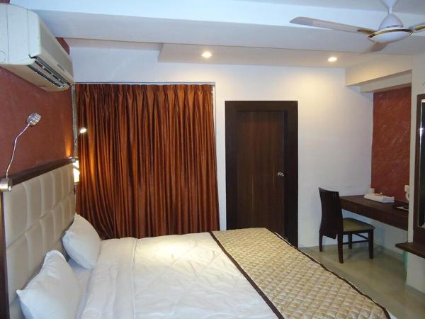 Hotel Maan Residency Satellite Road : photo 1 de la chambre chambre deluxe