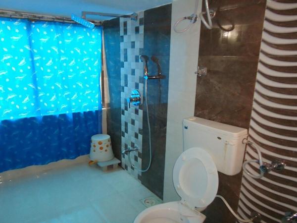 Hotel Maan Residency Satellite Road : photo 7 de la chambre chambre deluxe