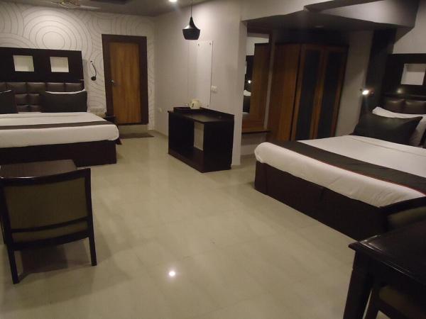 Hotel Maan Residency Satellite Road : photo 4 de la chambre suite