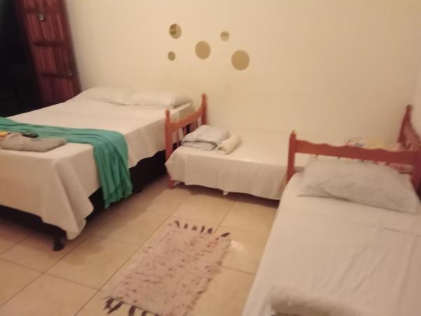 Pousada Caiçaras Búzios : photo 1 de la chambre chambre quadruple