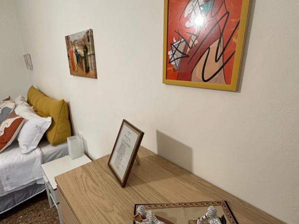 Dante Alighieri - Casa Babette : photo 9 de la chambre chambre lit king-size deluxe