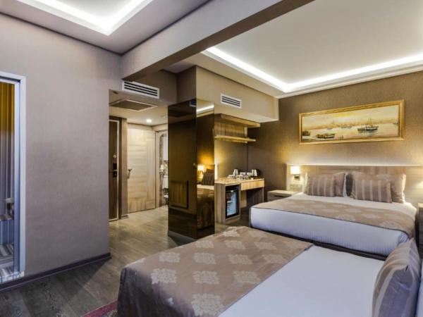 Ayramin Hotel Taksim : photo 1 de la chambre chambre triple supérieure avec hammam