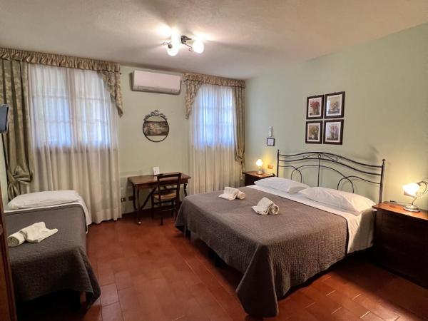 B&B Casale Virgili : photo 3 de la chambre chambre triple