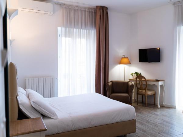 Residence Le Vie del Centro : photo 10 de la chambre chambre deluxe
