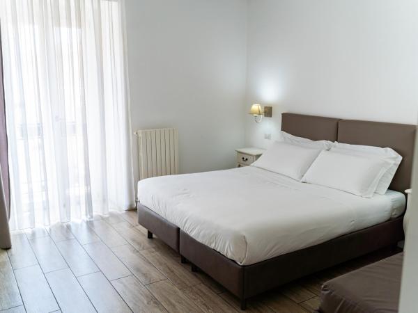 Residence Le Vie del Centro : photo 9 de la chambre chambre deluxe double ou lits jumeaux