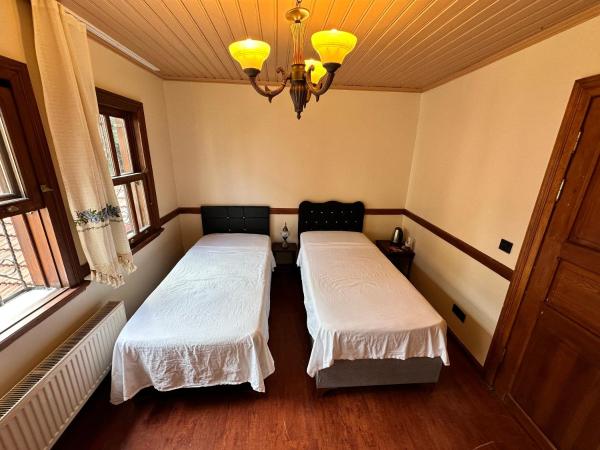 Melkan Otel Guest House : photo 4 de la chambre chambre lits jumeaux