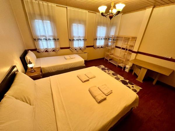Melkan Otel Guest House : photo 4 de la chambre chambre triple