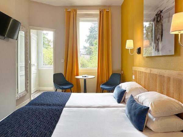Hôtel Coeur De Loire : photo 1 de la chambre chambre double ou lits jumeaux supérieure - vue sur jardin