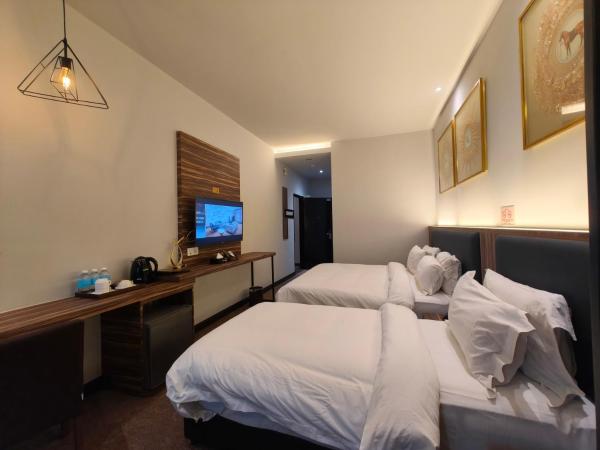 Asiatic Hotel : photo 3 de la chambre chambre triple