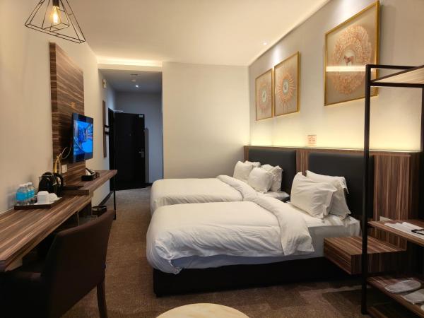 Asiatic Hotel : photo 5 de la chambre chambre triple