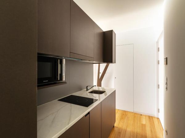 Pensao O Laranjeira : photo 1 de la chambre studio avec terrasse