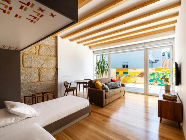 Pensao O Laranjeira : photo 6 de la chambre studio avec terrasse