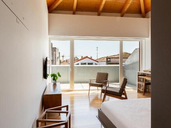 Pensao O Laranjeira : photo 6 de la chambre studio avec terrasse