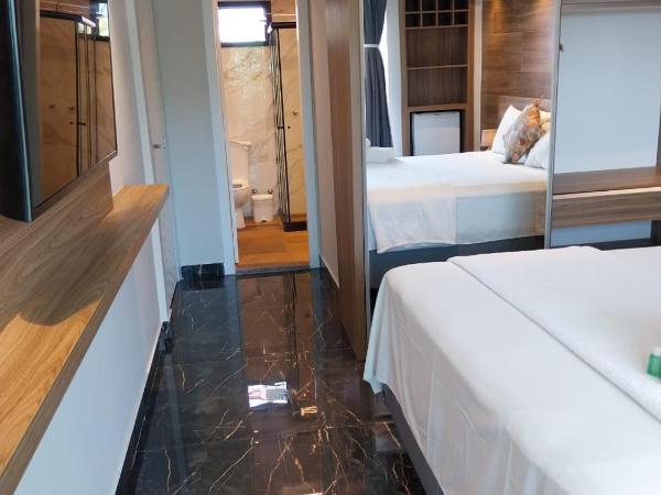 Hotel Pousada Casacolina : photo 8 de la chambre suite deluxe avec baignoire spa