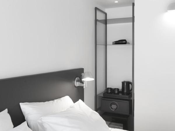 Creto Hotel Myeongdong : photo 2 de la chambre chambre lits jumeaux familiale avec netflix