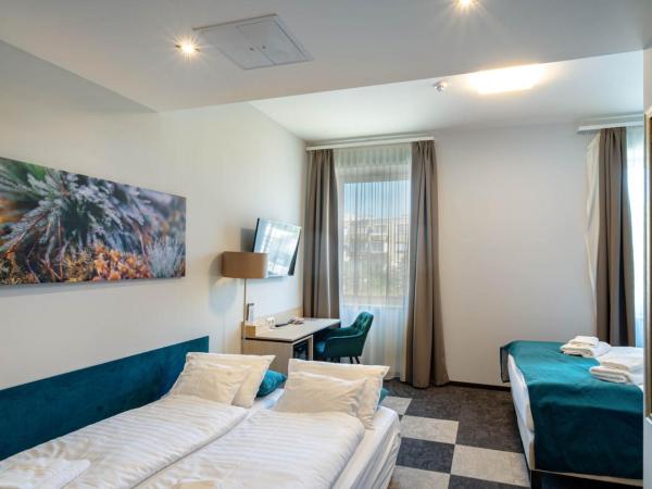 Inter Hotel : photo 2 de la chambre chambre quadruple supérieure 