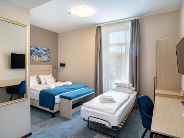 Inter Hotel : photo 1 de la chambre chambre double deluxe avec lit d'appoint