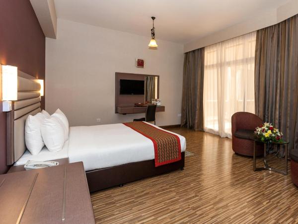 Wave International Hotel : photo 5 de la chambre chambre deluxe standard