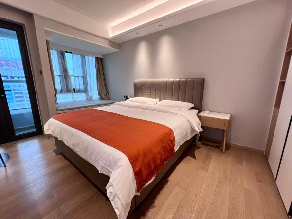 Kaisen Xiyue Hotel Apartment - Shenzhen International Convention and Exhibition Center : photo 10 de la chambre chambre lit queen-size deluxe