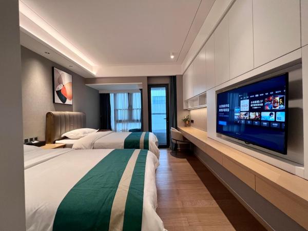 Kaisen Xiyue Hotel Apartment - Shenzhen International Convention and Exhibition Center : photo 2 de la chambre chambre lits jumeaux deluxe