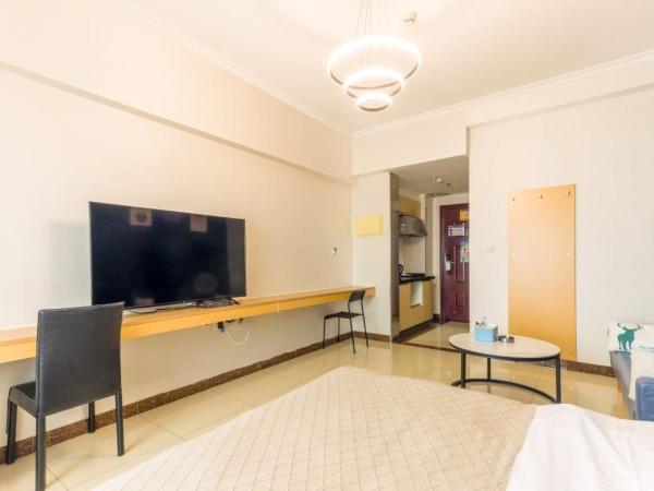 广州朴宿漫享公寓(琶洲国际会展中心店) : photo 2 de la chambre chambre lit queen-size