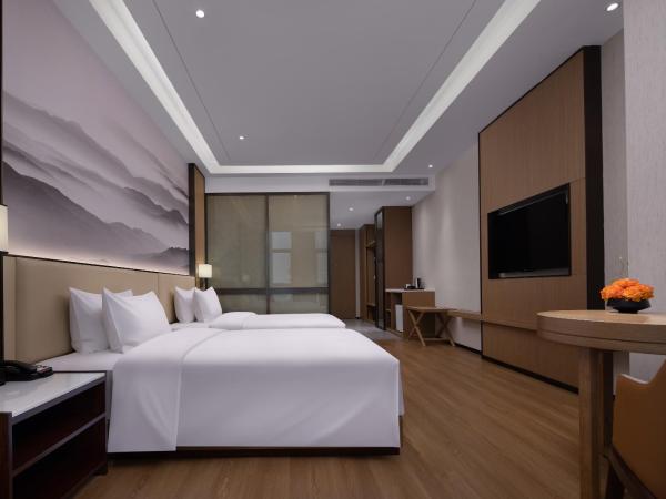 Metropark Hotel Wuhan : photo 4 de la chambre chambre lits jumeaux supérieure