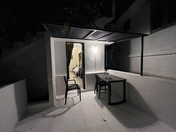 Eden Garden Farm Stay : photo 3 de la chambre chambre triple - vue sur jardin