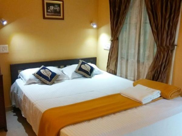 Eden Garden Farm Stay : photo 4 de la chambre chambre triple - vue sur jardin