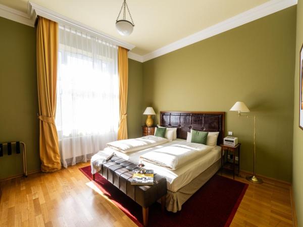 Louisa's Place : photo 3 de la chambre suite lit king-size avec balcon