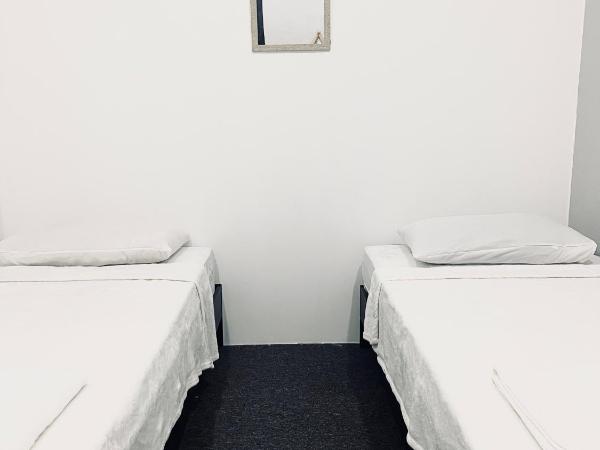 AK Greenrise Meru : photo 7 de la chambre chambre double ou lits jumeaux avec salle de bains commune