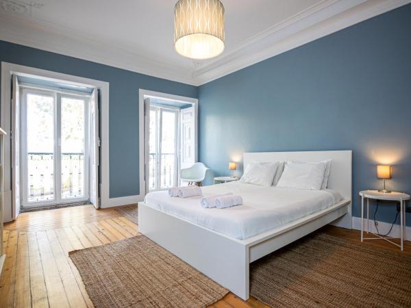 VAGO Alcântara Suites : photo 1 de la chambre chambre triple standard