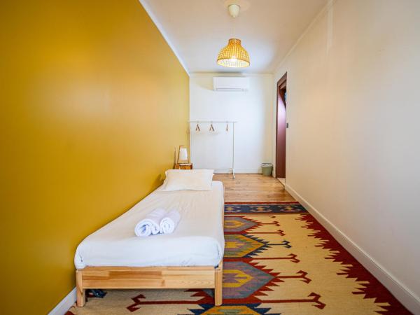 VAGO Alcântara Suites : photo 7 de la chambre chambre triple standard