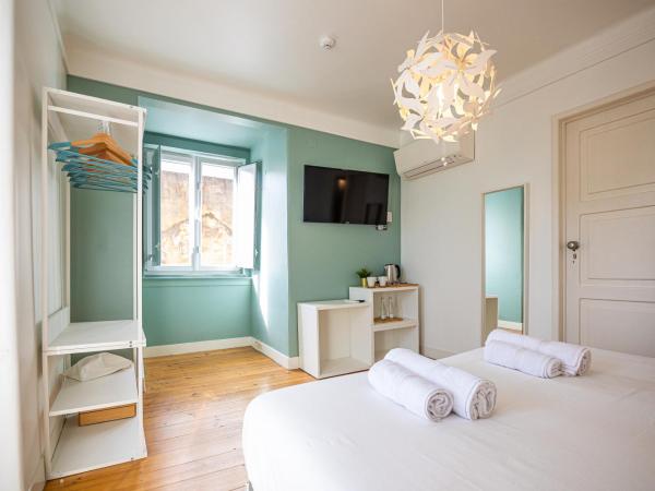 VAGO Alcântara Suites : photo 5 de la chambre chambre double standard