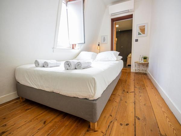 VAGO Alcântara Suites : photo 1 de la chambre chambre double