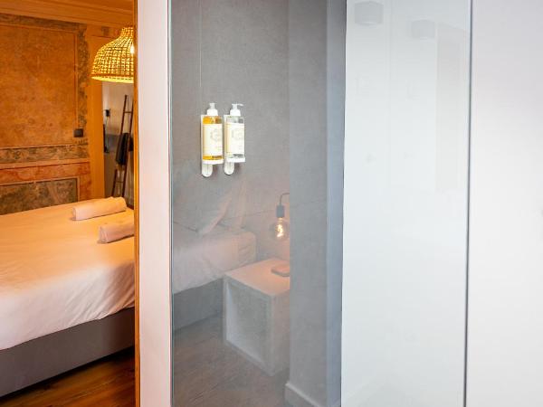 VAGO Alcântara Suites : photo 3 de la chambre chambre triple standard