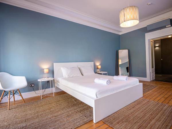 VAGO Alcântara Suites : photo 2 de la chambre chambre triple standard