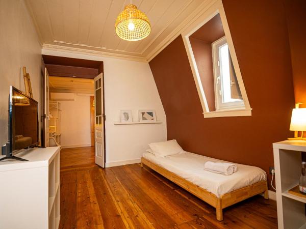 VAGO Alcântara Suites : photo 6 de la chambre chambre triple standard