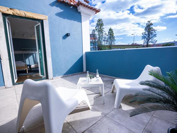 VAGO Alcântara Suites : photo 8 de la chambre chambre double standard