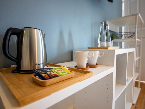 VAGO Alcântara Suites : photo 9 de la chambre chambre triple standard