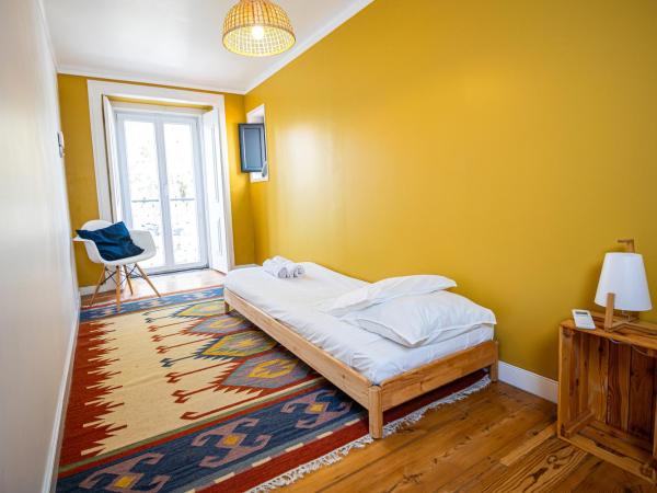 VAGO Alcântara Suites : photo 6 de la chambre chambre triple standard