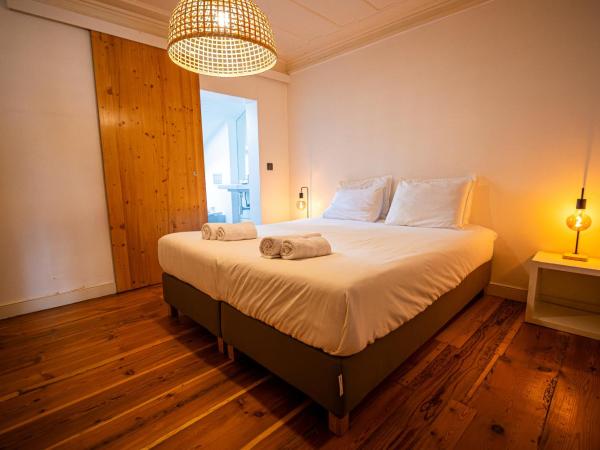 VAGO Alcântara Suites : photo 5 de la chambre chambre triple standard